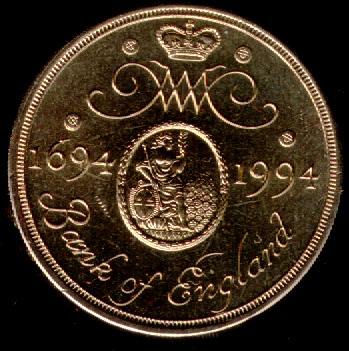 Печать Банка Англии, переплетение W&M, увенчанное короной. Легенда: Банк Англии, 1694 г., 1994 г.