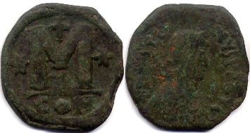 монета Византия Юстин I фоллис